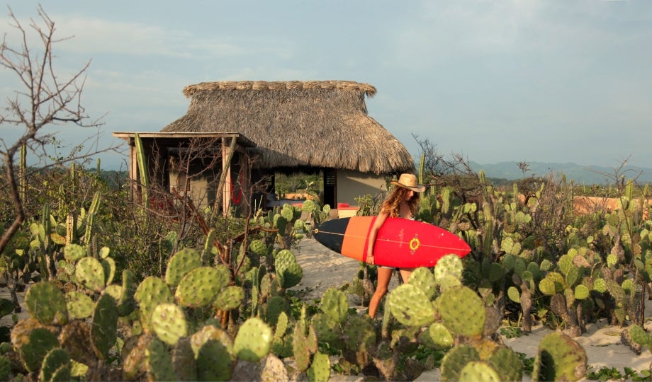 One of the thatched cabanas