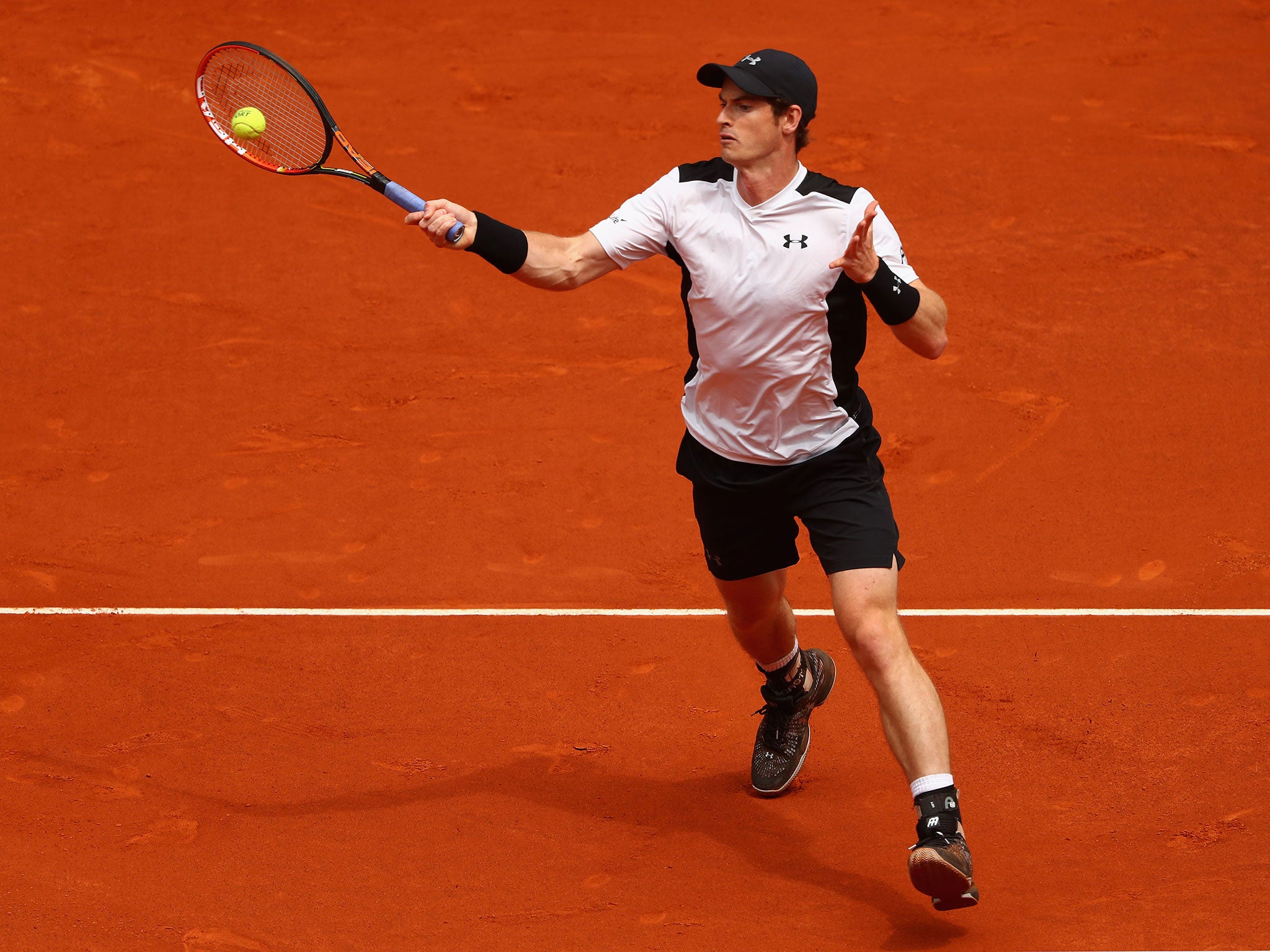 Andy Murray strikes the ball at the Madrid Masters
