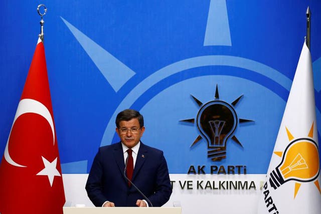Ahmet Davutoglu speaks during a news conference in Ankara