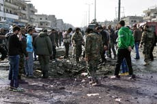 10 die as suicide bomber targets crowd trying to help car bomb victims in Syria