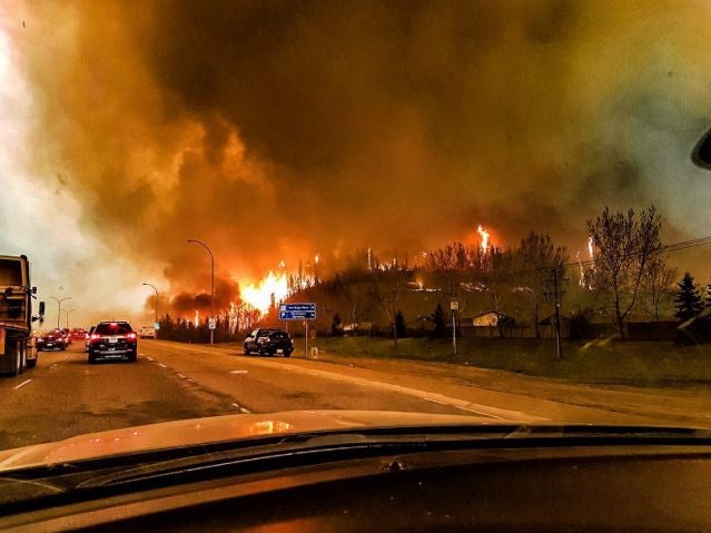 Residents escape the flames engulfing Fort McMurray