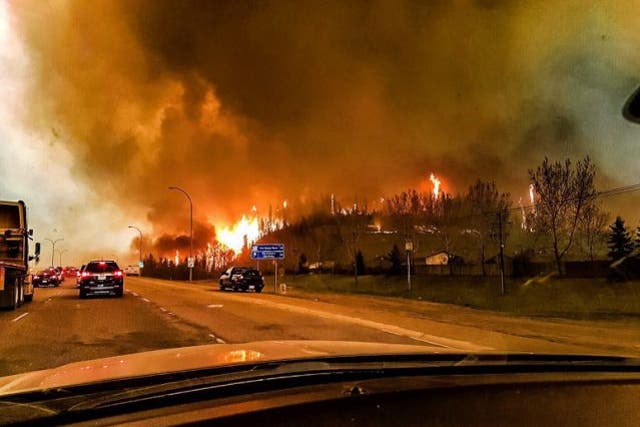 Residents escape the flames engulfing Fort McMurray