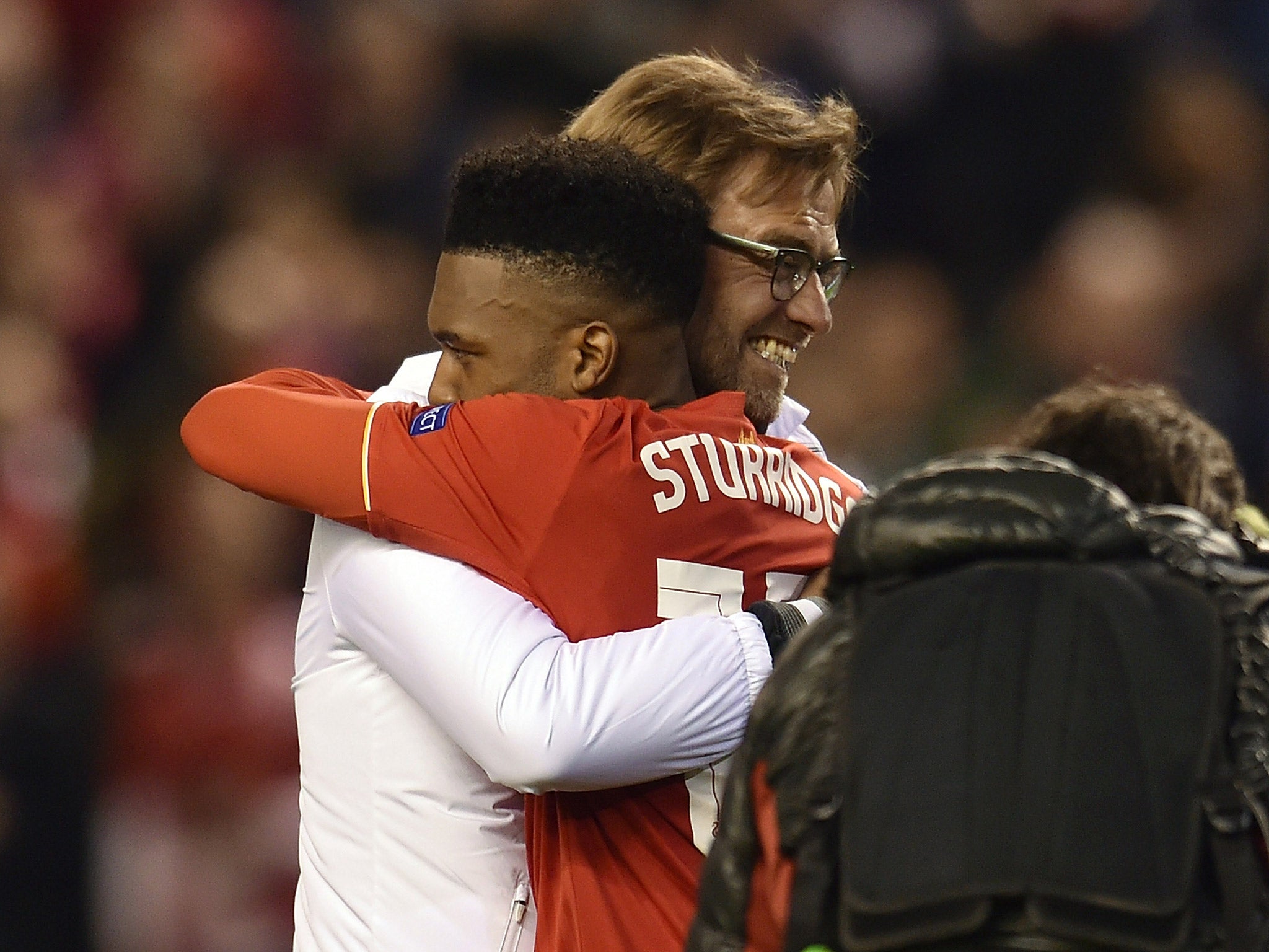 Liverpool manager Jurgen Klopp hugs Daniel Sturridge after the 3-0 win over Villarreal