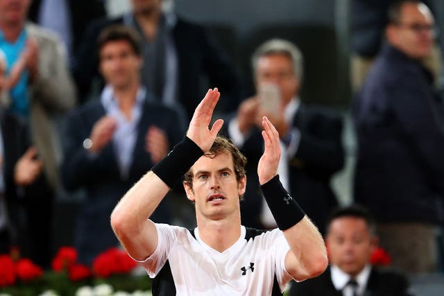 Andy Murray celebrates reaching the semi-final of the Madrid Masters