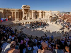 Russia stages classical concert in Palmyra amid continued fighting