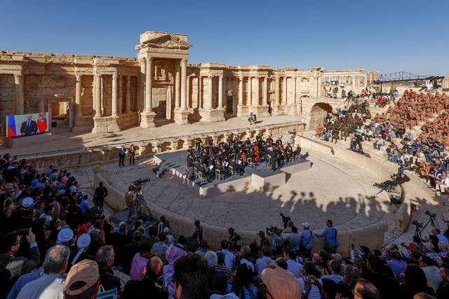 Russian conductor Valery Gergiev leads a concert in the amphitheatre of the ancient city of Palmyra on May 5, 2016.