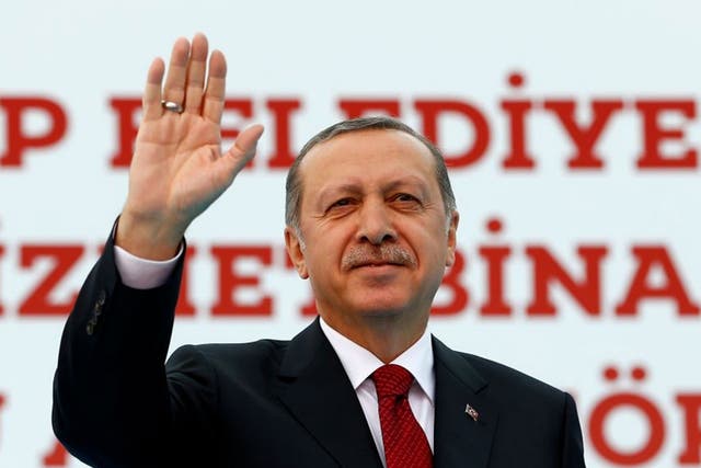 Turkish President Tayyip Erdogan greets his supporters during an opening ceremony in Istanbul, Turkey on 6 May 2016
