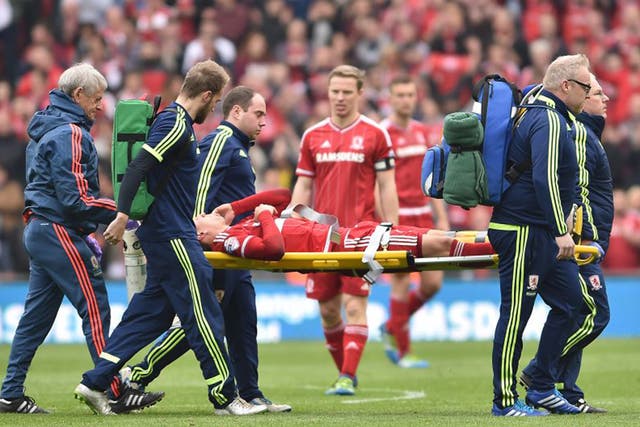 Gaston Ramirez is carried off with injury during Middlesbrough's 1-1 draw with Brighton