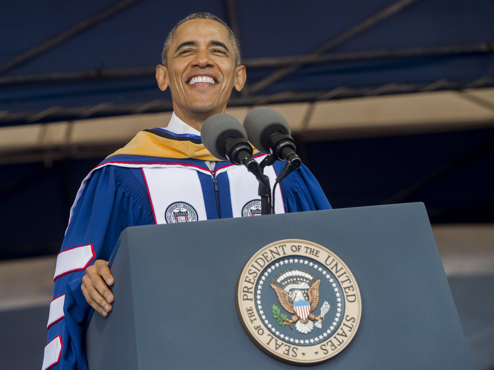 Mr Obama delivered the first of his three last commencement speeches as president Saul Loeb/Getty