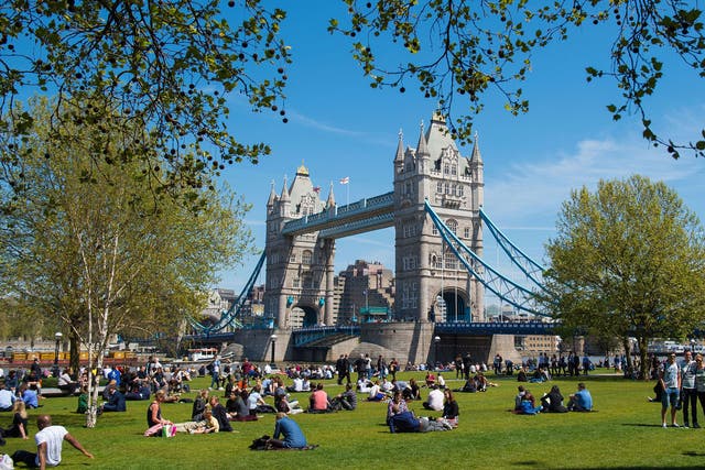 People enjoy the sun in Potters Fields in London, as many parts of the UK enjoy a day of warm weather