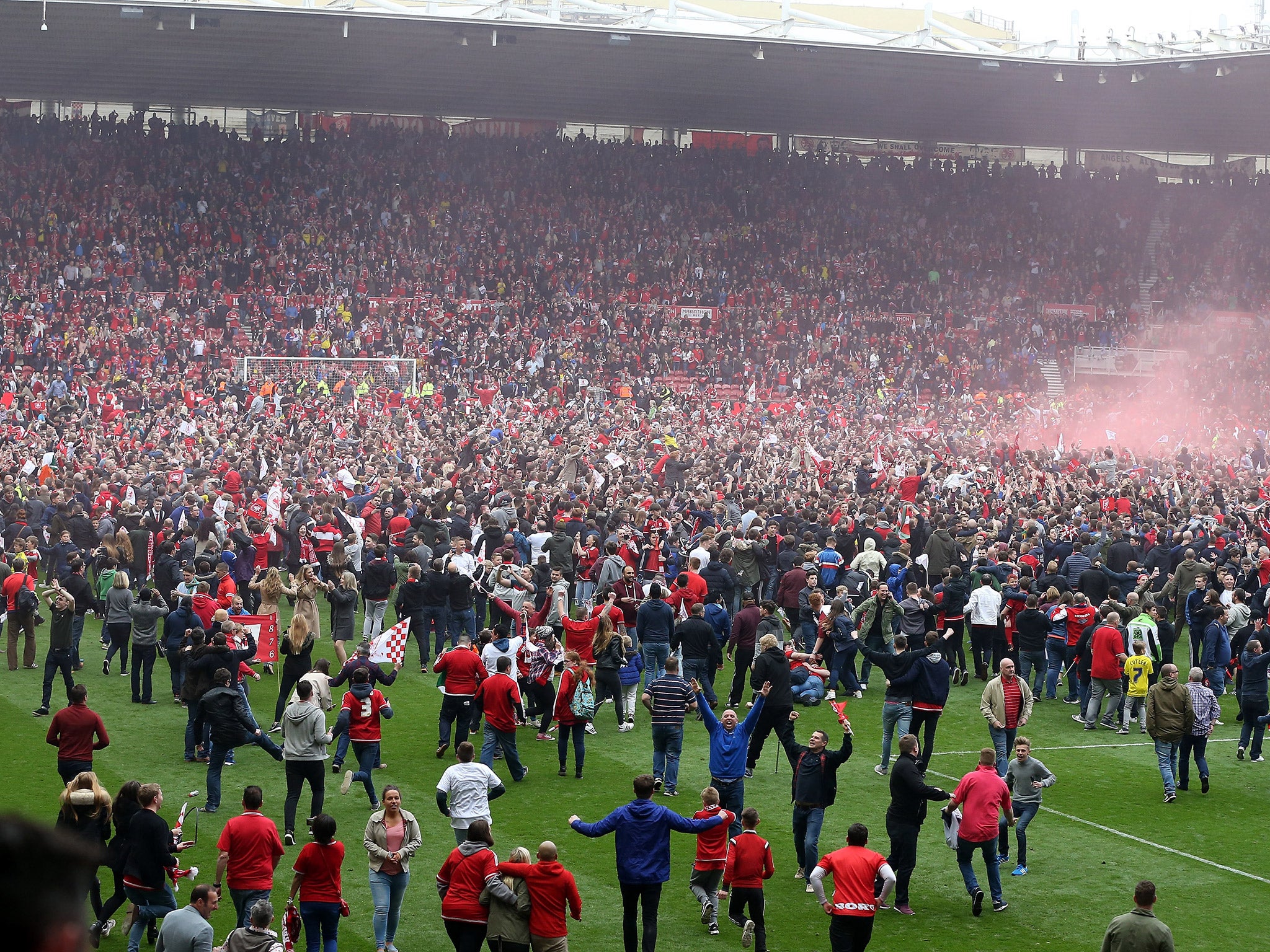 Middlesbrough fans celebrate after securing promotion to the Premier League