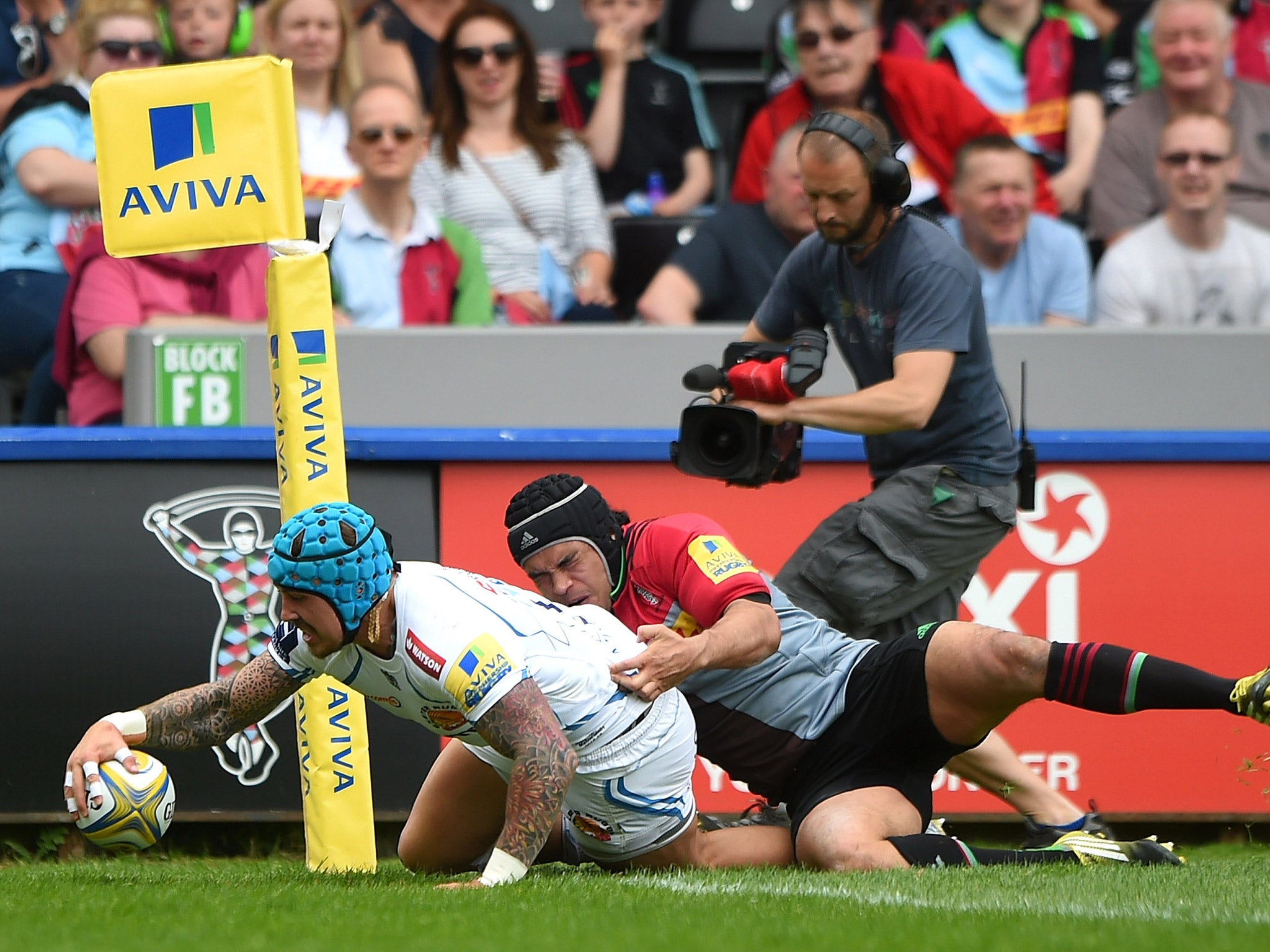 England wing Jack Nowell scores one of his three tries against Harlequins