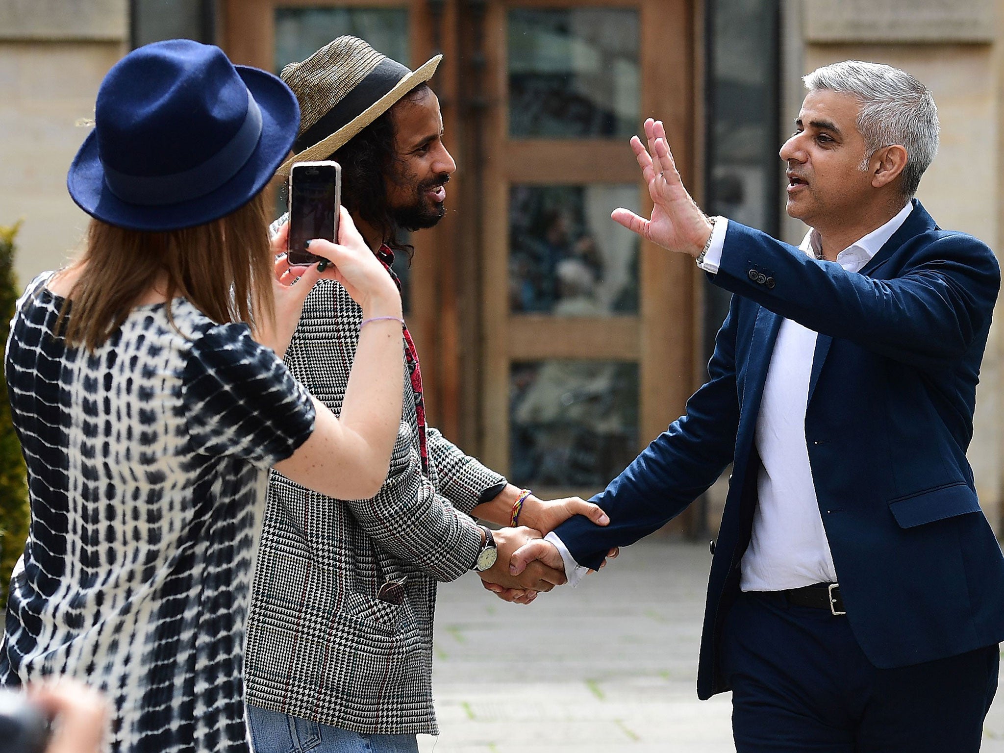 The new London mayor greets well-wishers outside Southwark Cathedral after attending his swearing-in ceremony