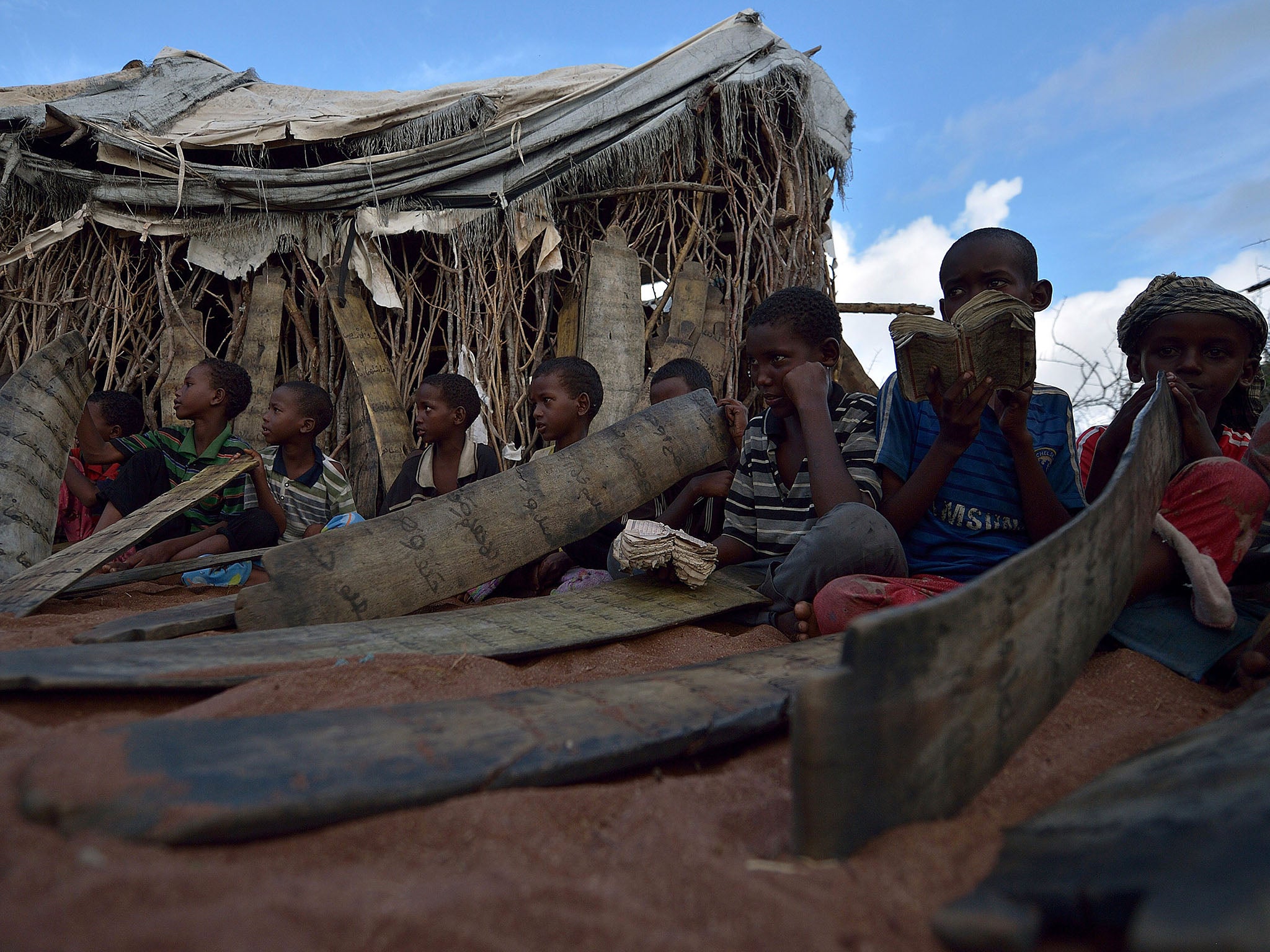 Young Somali boys attending school lessons in the Dadaab refugee camp