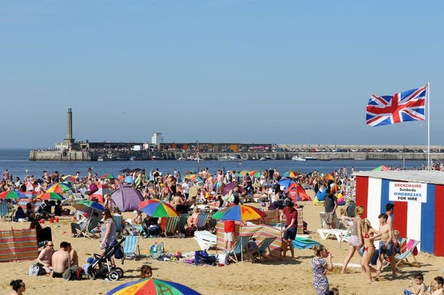 People making the most of the sunshine in Margate, Kent as temperatures reach the high 20s in southern England