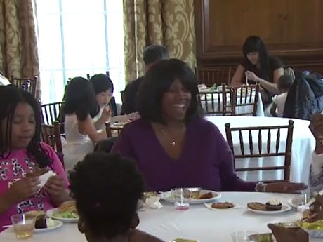 &#13;
Guests eating at the luncheon &#13;
