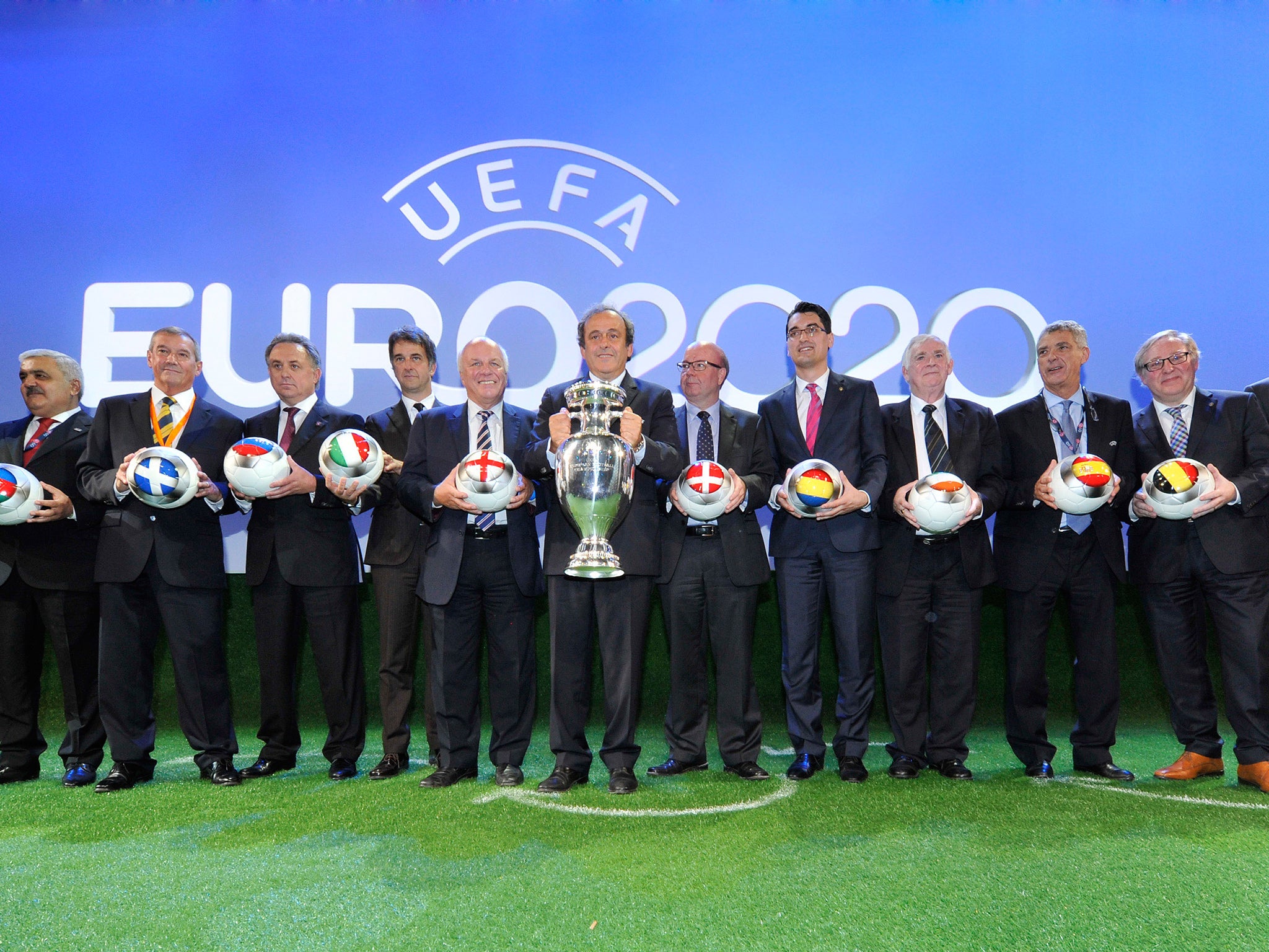 Platini poses with European football association chairmen following the Euro 2020 host cities &amp; final announcement ceremony in 2014