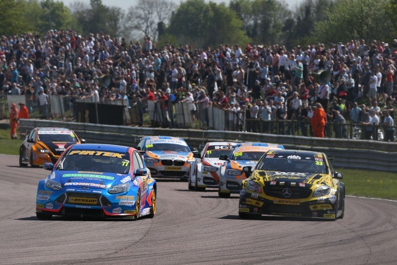 &#13;
Andrew Jordan passes Adam Morgan on the way to race two victory &#13;