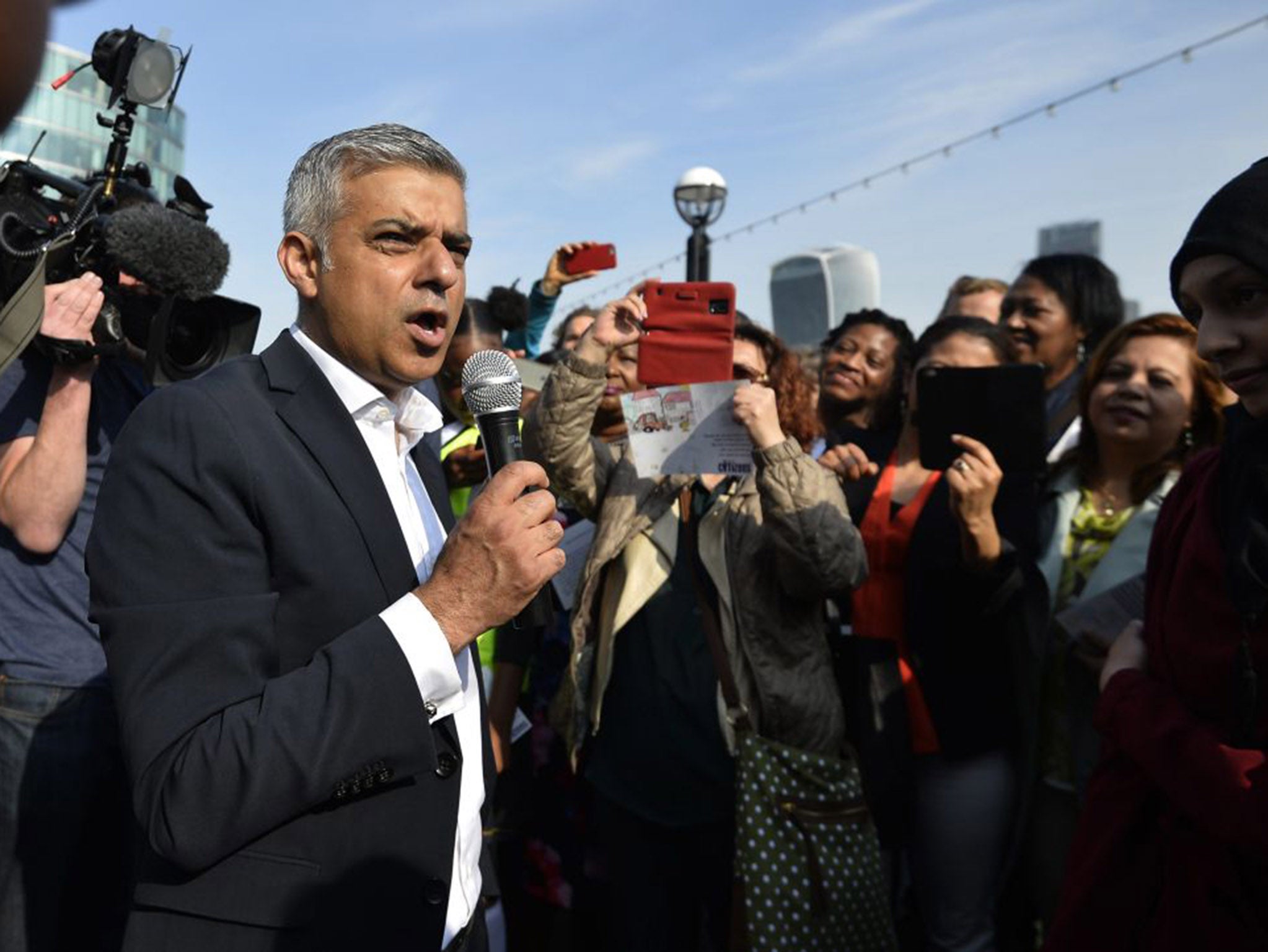 London's newly elected mayor Sadiq Khan speaks to supporters on his first day at City Hall