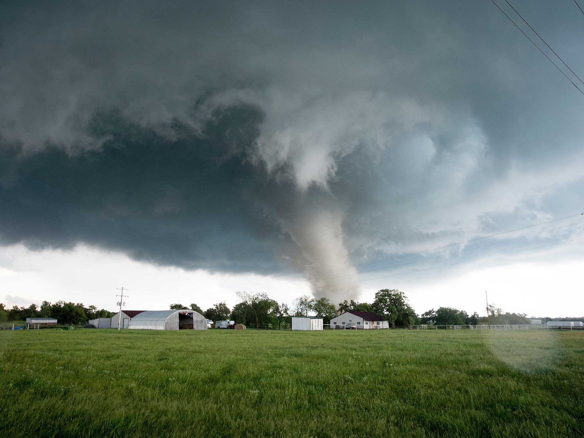 A tornado rips through a residential area after touching down south of Wynnewood, Oklahoma in the US
