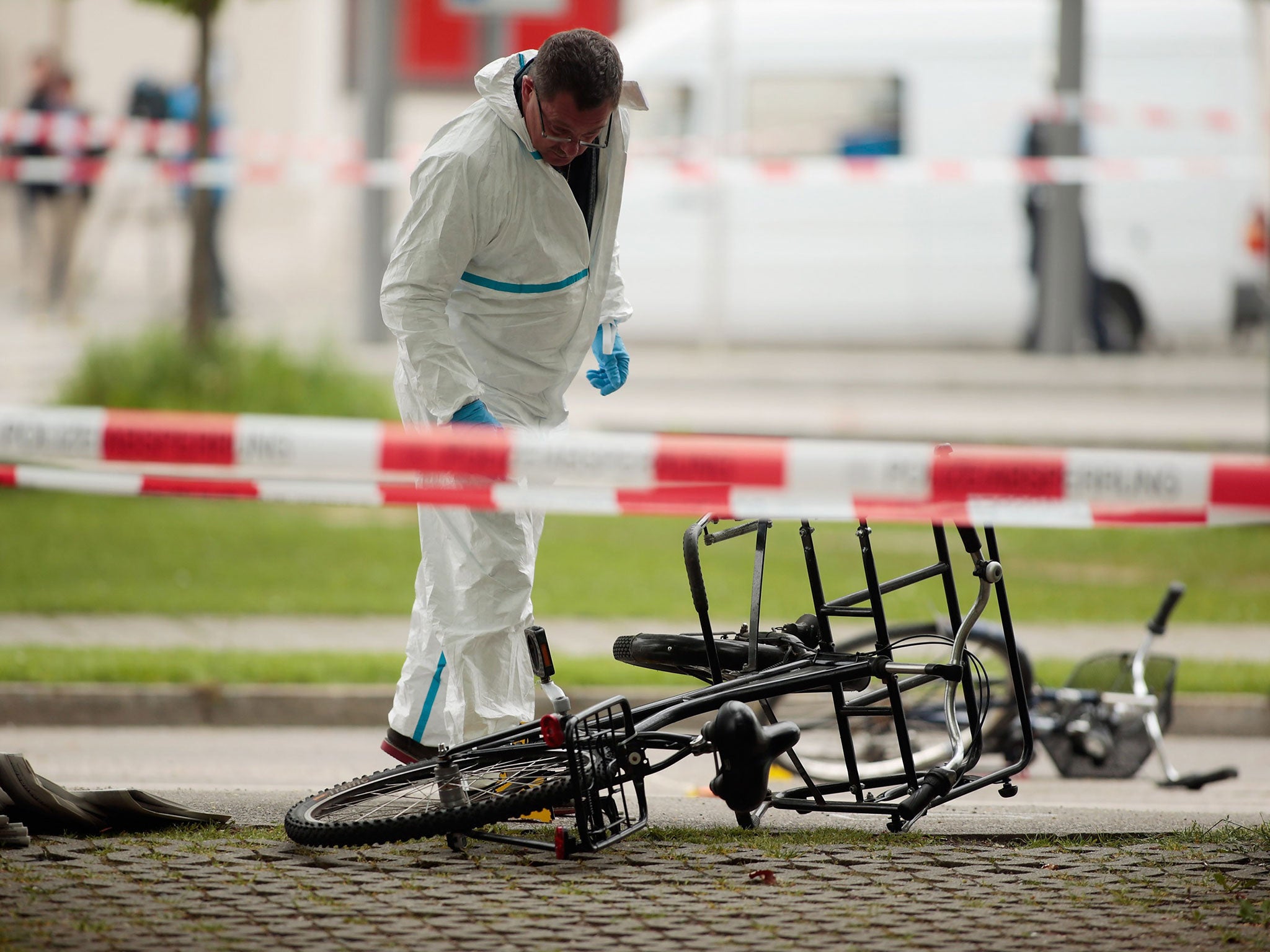 Two bicycles at the scene of a deadly knife attack at a railway station in Grafing, Bavaria, on 10 May 2016