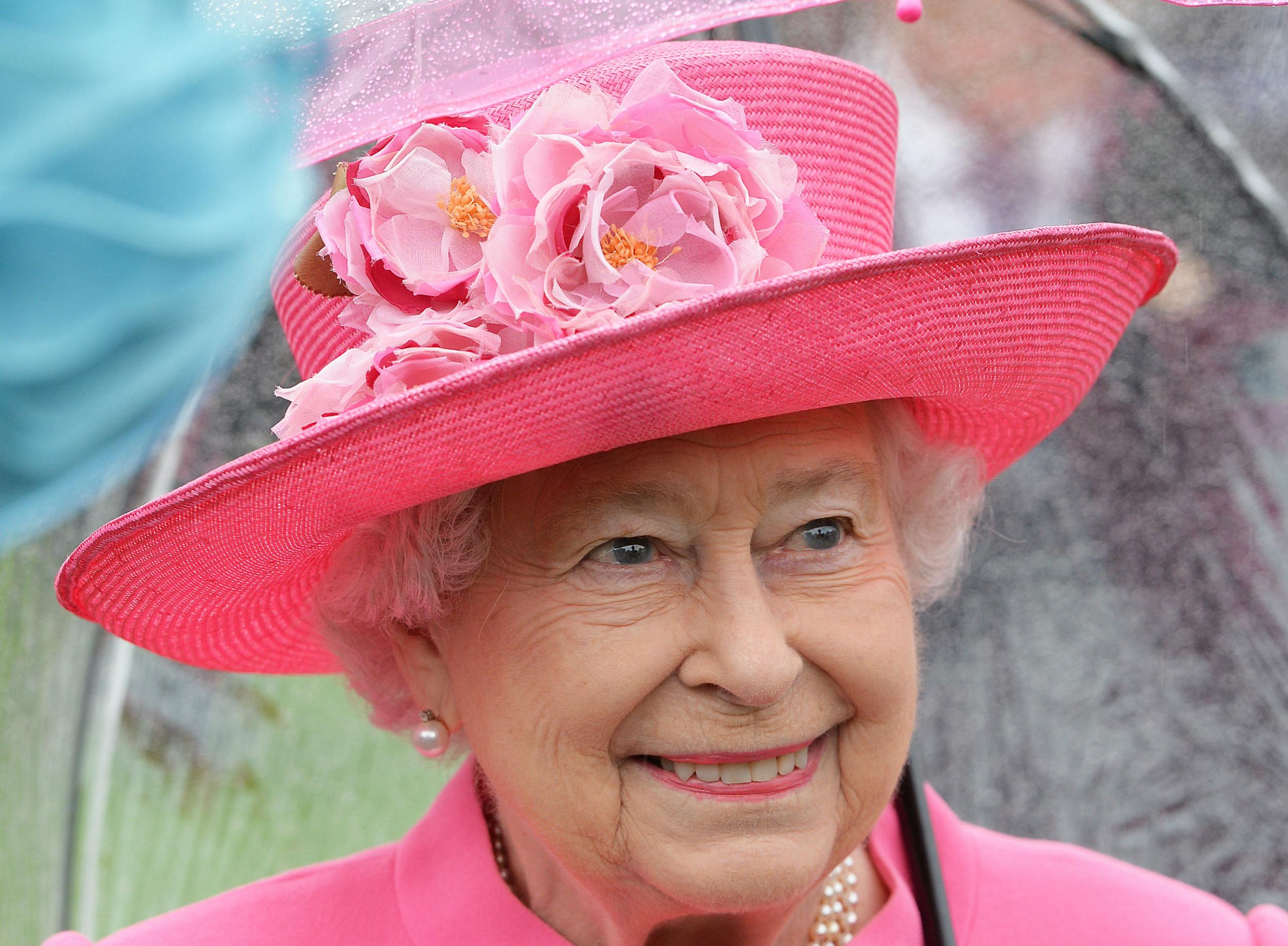 Queen Elizabeth Is Pretty in Pink as She Arrives to 21-Gun Salute in Wales