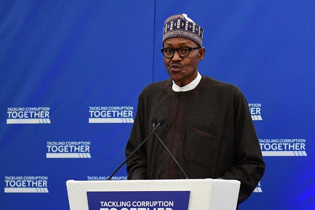 Nigerian President Muhammadu Buhari addresses delegates at the start of a conference to tackle corruption at the Commonwealth Secretariat in London on May 11, 2016