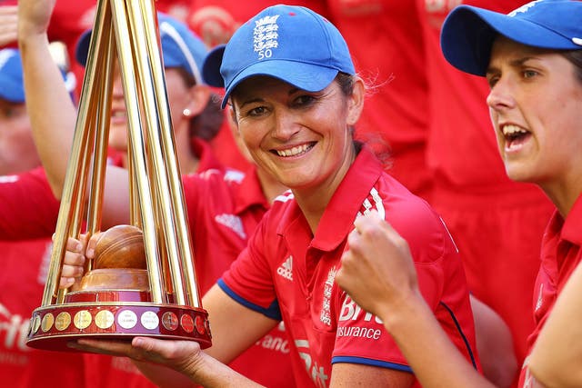 Charlotte Edwards poses with the Ashes trophy after winning the 2014 series