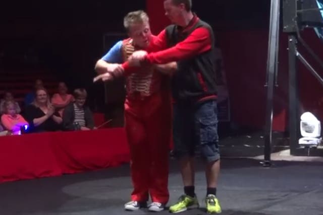 Ben Garnham on stage with the clown just before it goes badly wrong