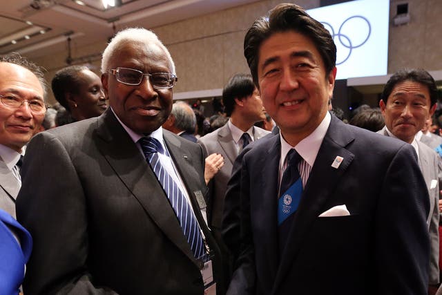 Lamine Diack with Japan Prime Minister Shinzo Abe after Tokyo wins 2020 bid <em>Ian Walton/Getty</em>