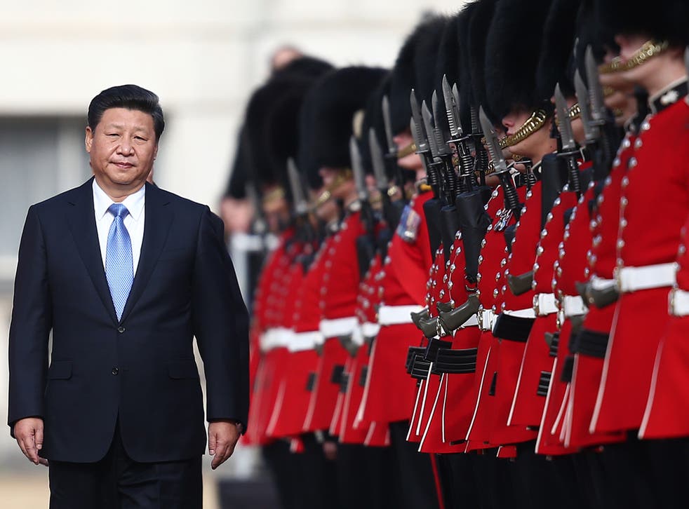 Chinese president Xi Jinping, pictured receiving a guard of honour in London, telephoned Mr Trump once again