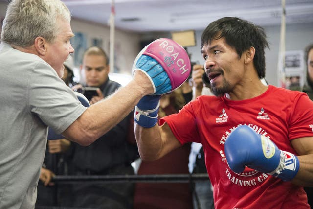 Freddie Roach trains Manny Pacquiao at his Wild Card gym