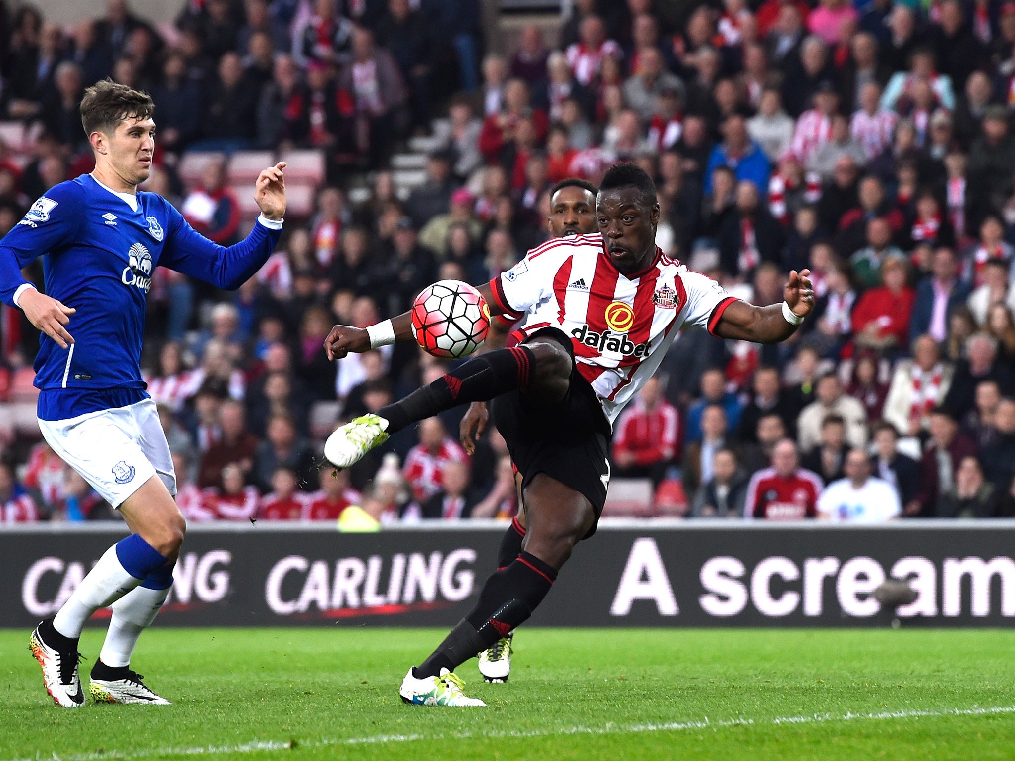 Lamine Kone rifles in his first of the game with an acrobatic volley