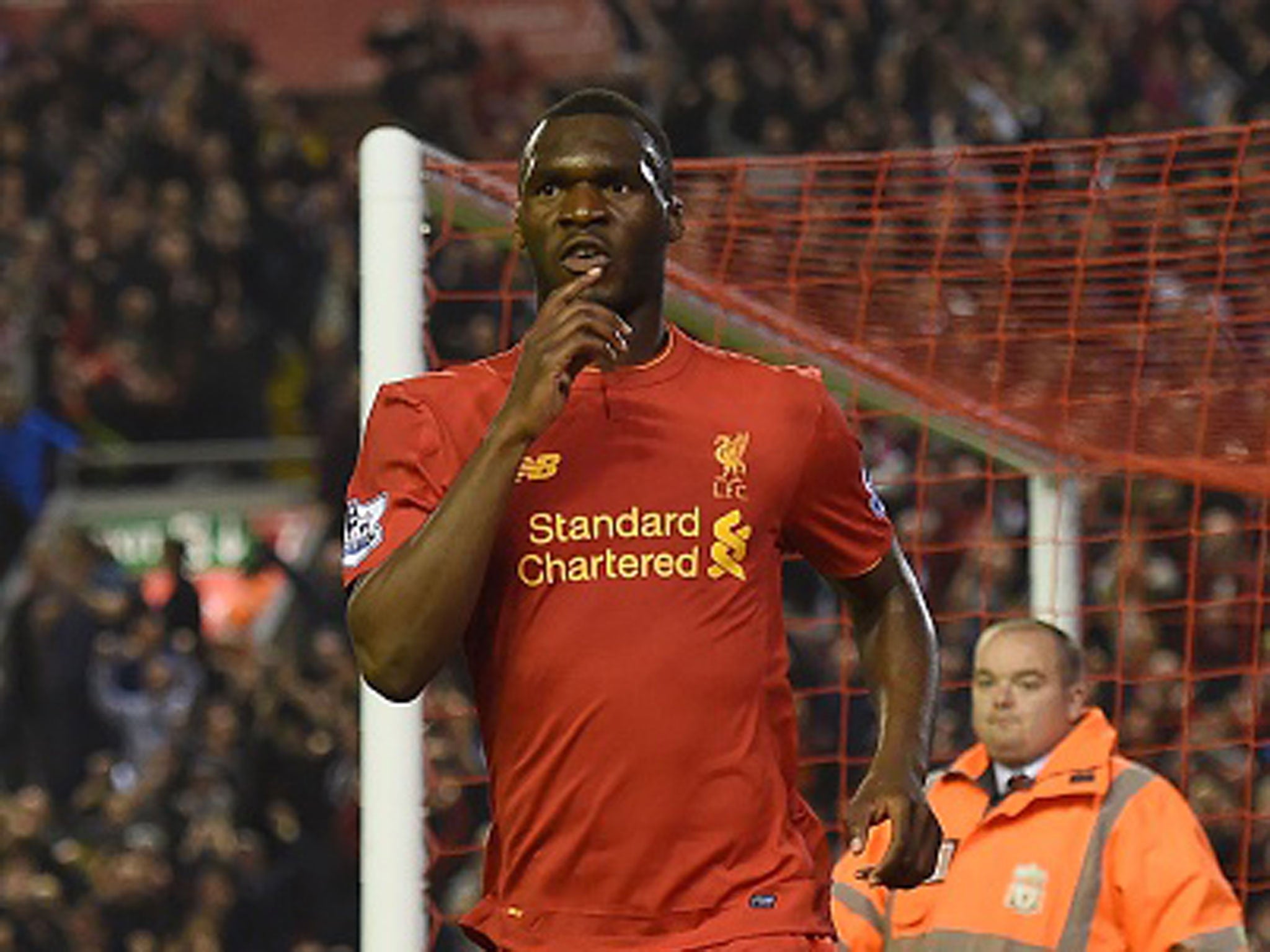 Christian Benteke celebrates his late equaliser which earned Liverpool a point at home to Chelsea on Wednesday (Getty)