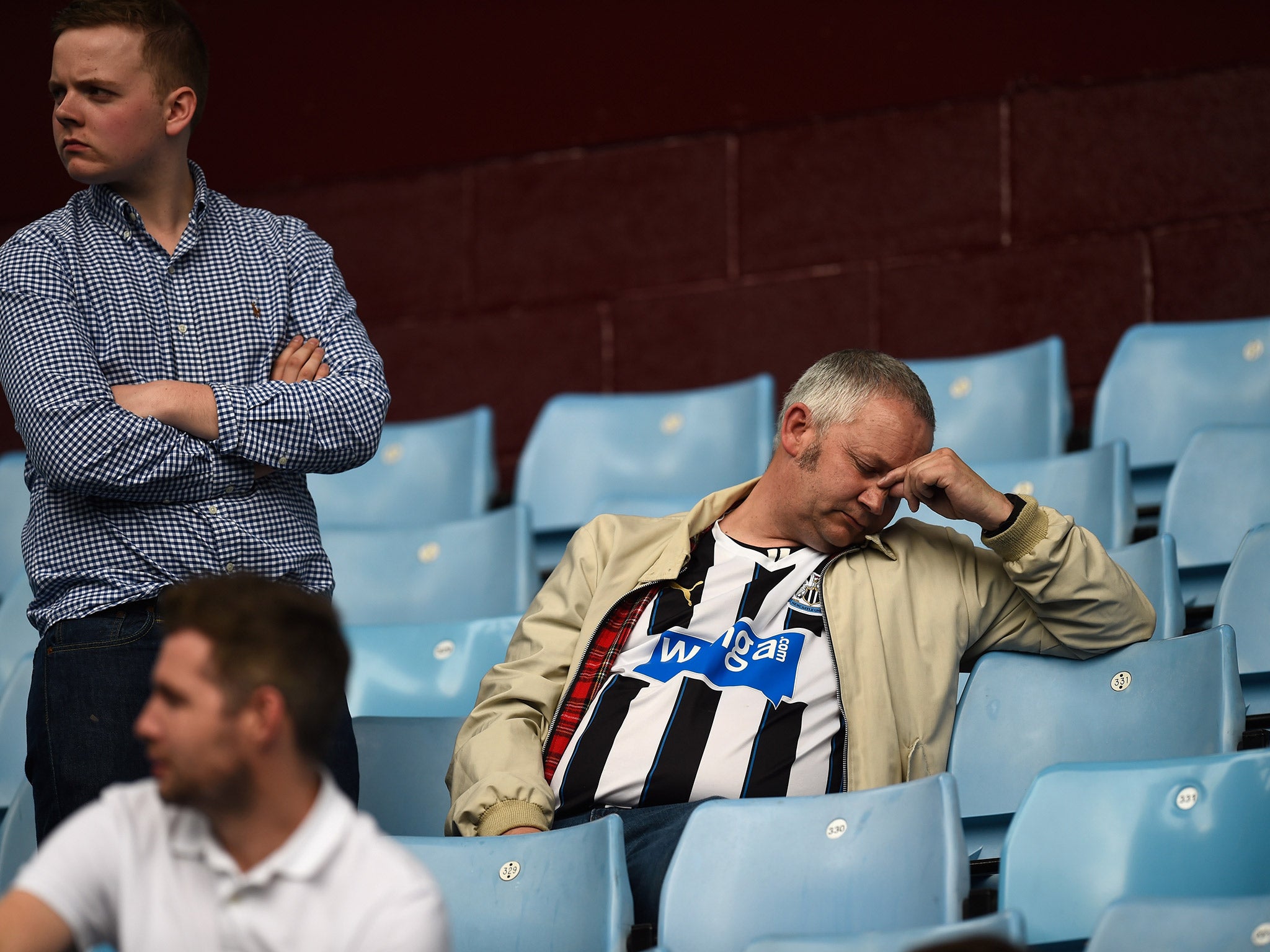 A Newcastle fan reacts to the 0-0 draw with Aston Villa