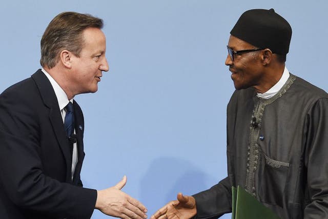 The PM greets Nigerian President Muhammadu Buhari at a session of the Anti-Corruption Summit. Earlier this week David Cameron was overheard describing the African nation as 'fantastically corrupt'