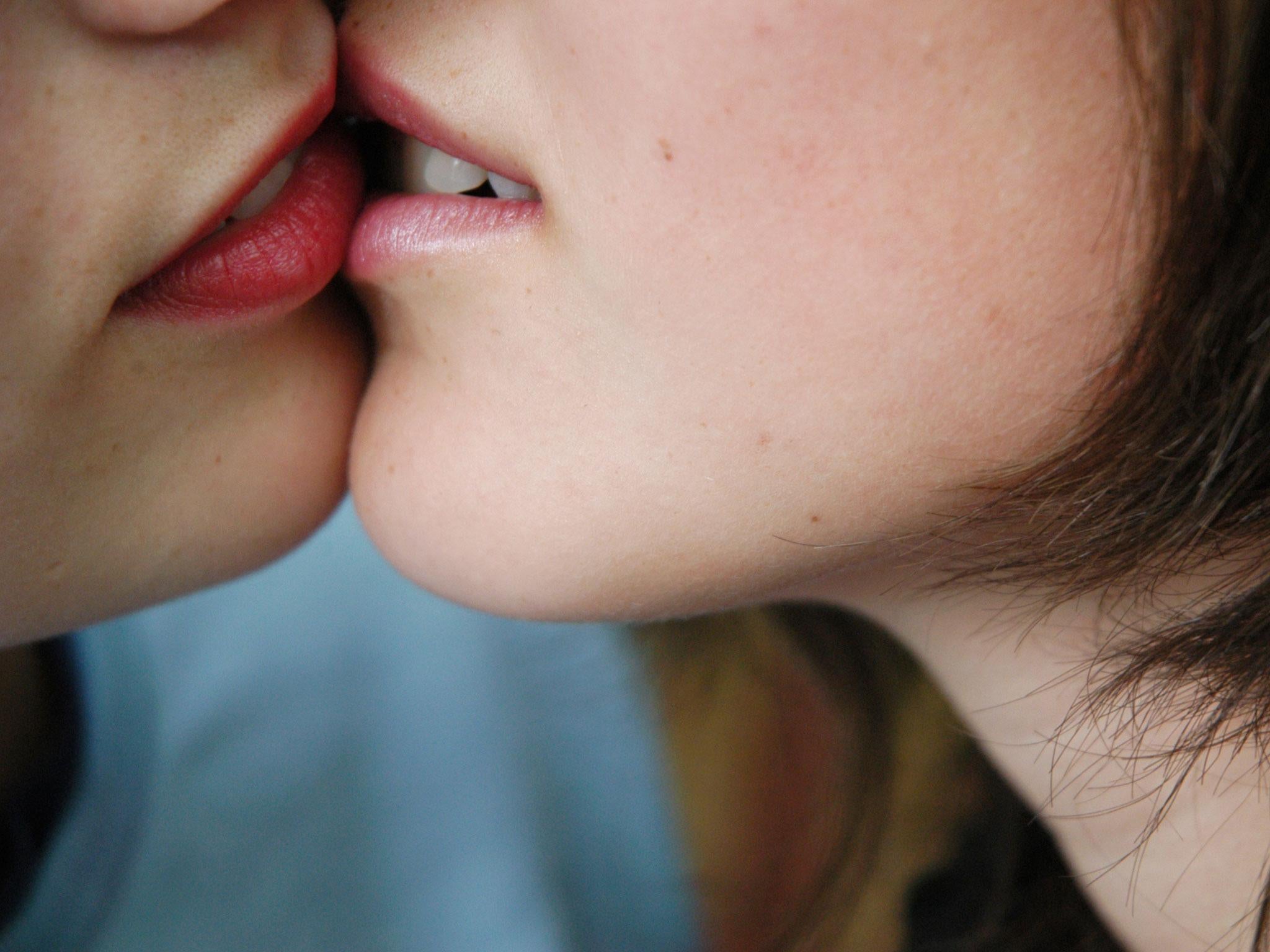 The teenagers were caught kissing on the roof of a building and reported to the police