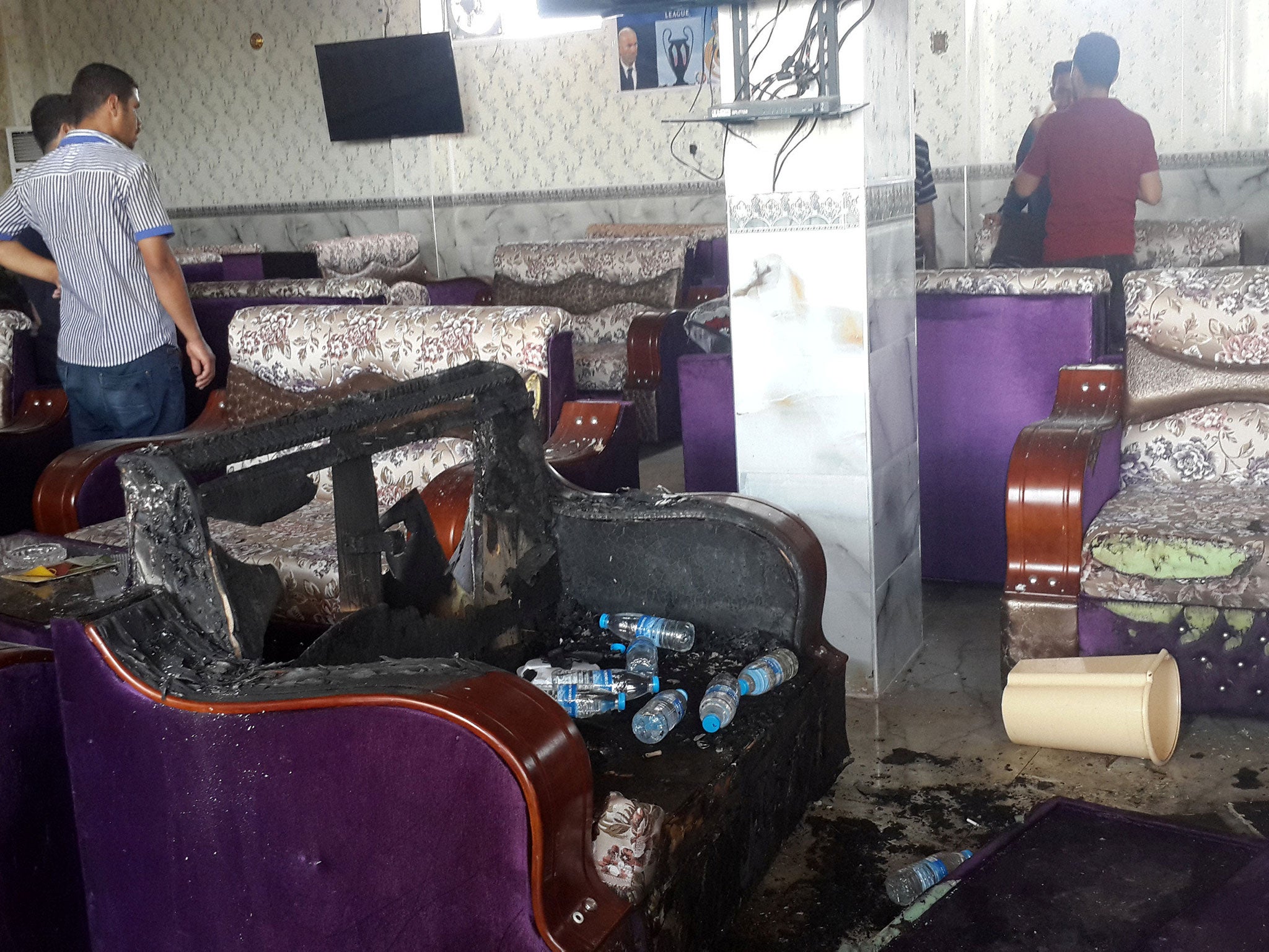 Damage inside a cafe after an attack in the predominately Shia Muslim city of Balad, Iraq, May 13 2016.