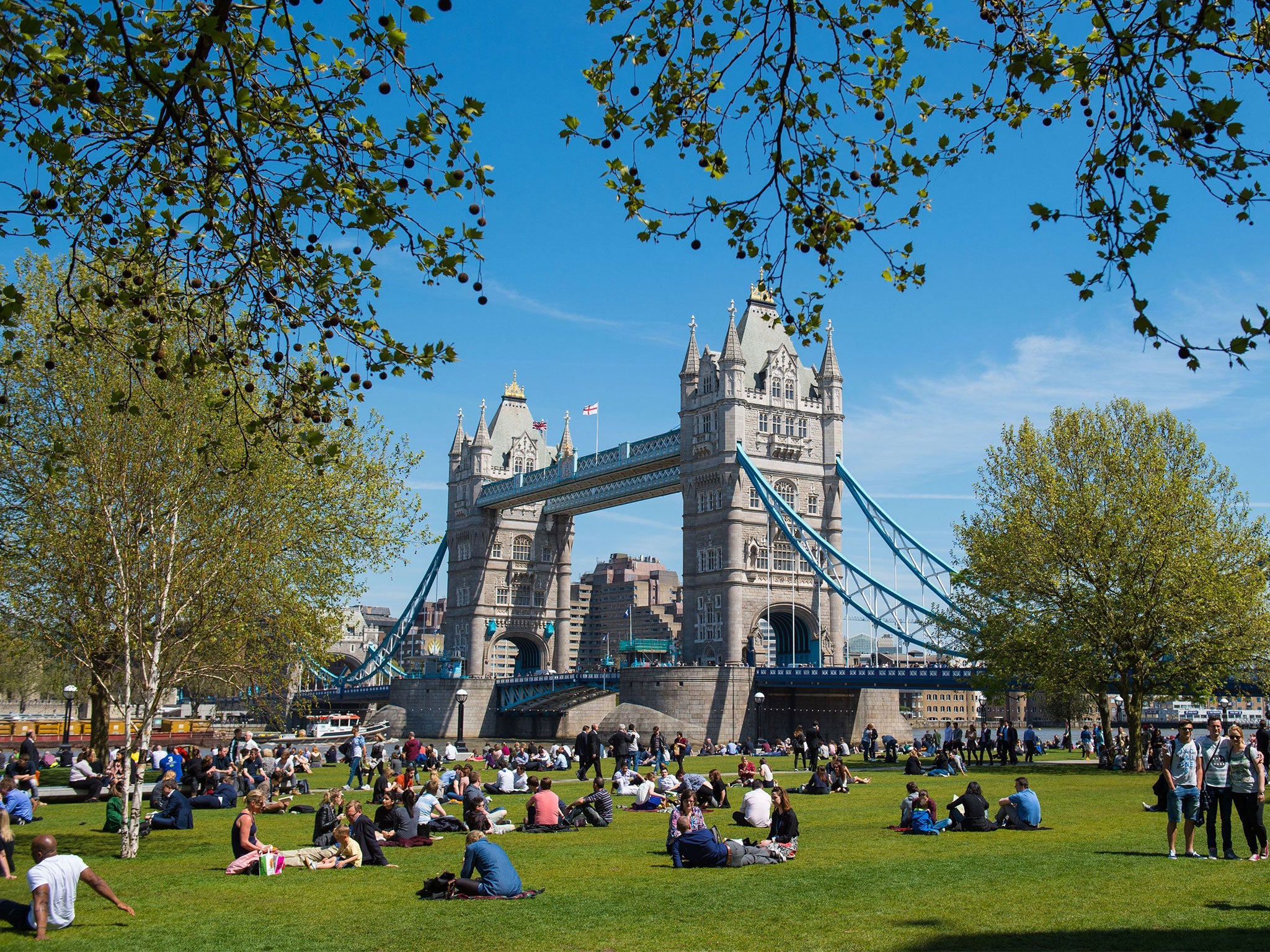Visitors to Potters Field Park, London, during highs of 27C in May