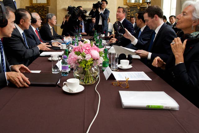 Both Mark Carney (left) and Christine Lagarde (right), pictured in the UK in 2014, backed David Cameron this week