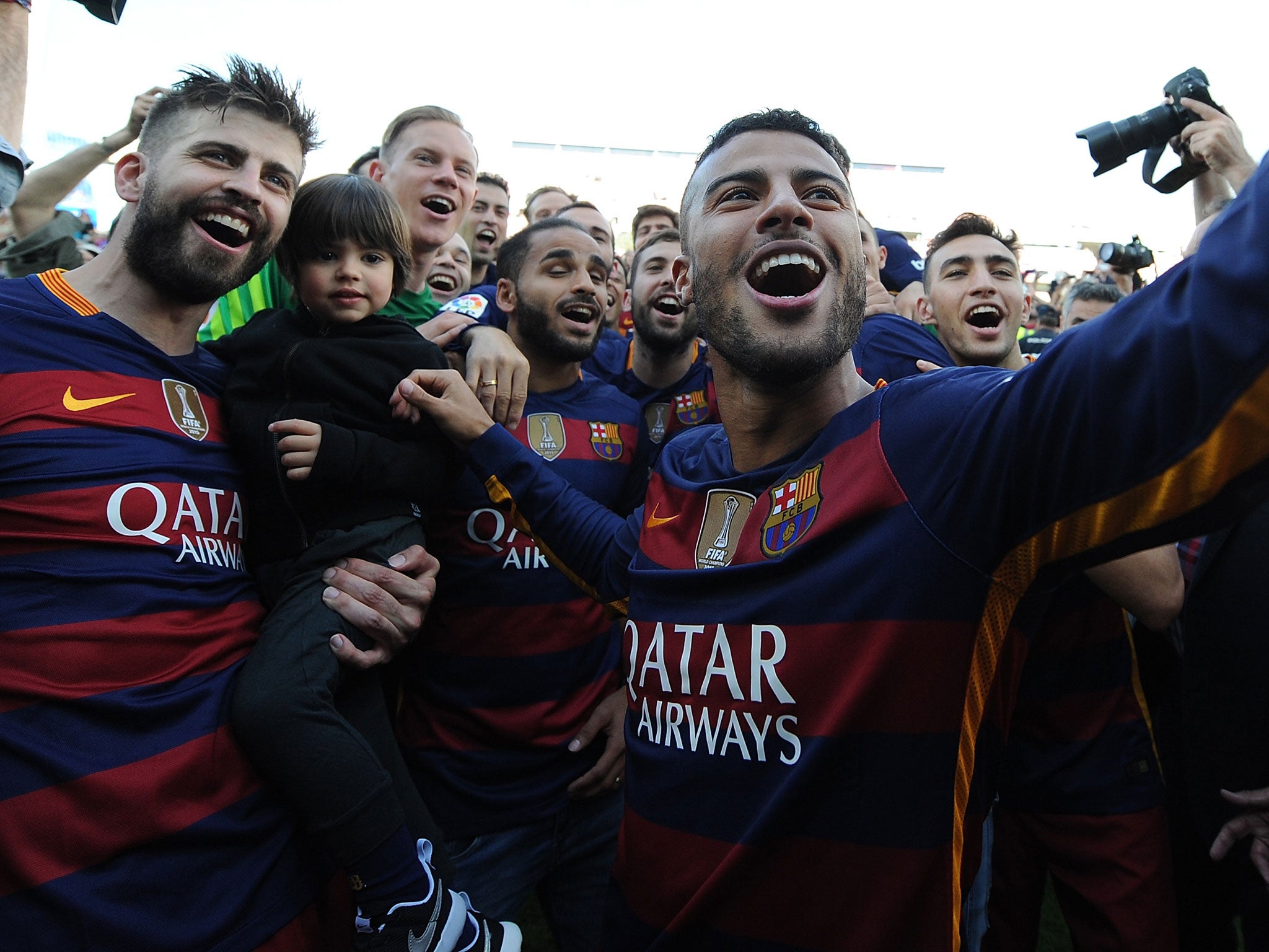 Gerard Pique celebrates after Barcelona win La Liga