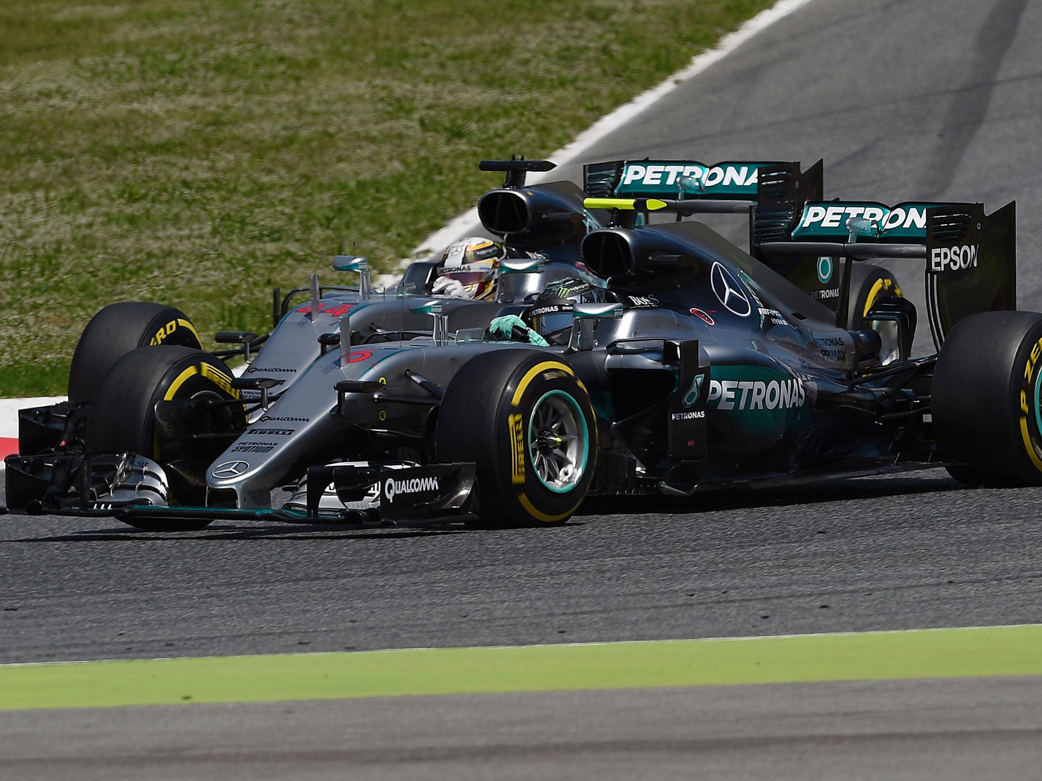 Hamilton and Rosberg vie for position on the first lap of the Spanish Grand Prix