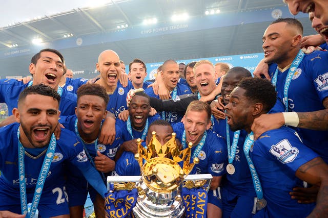 Leicester City celebrate with the Premier League trophy