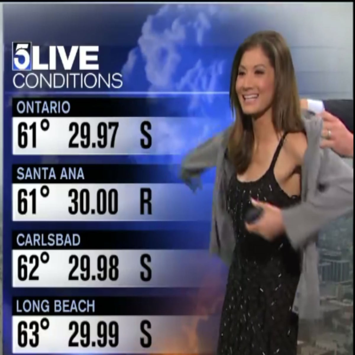 Weather presenter Liberte Chan handed cardigan to wear on air after viewers  complain about her dress | The Independent | The Independent