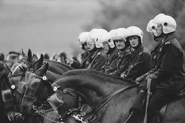 Mounted policemen lined up at Orgreave coking plant