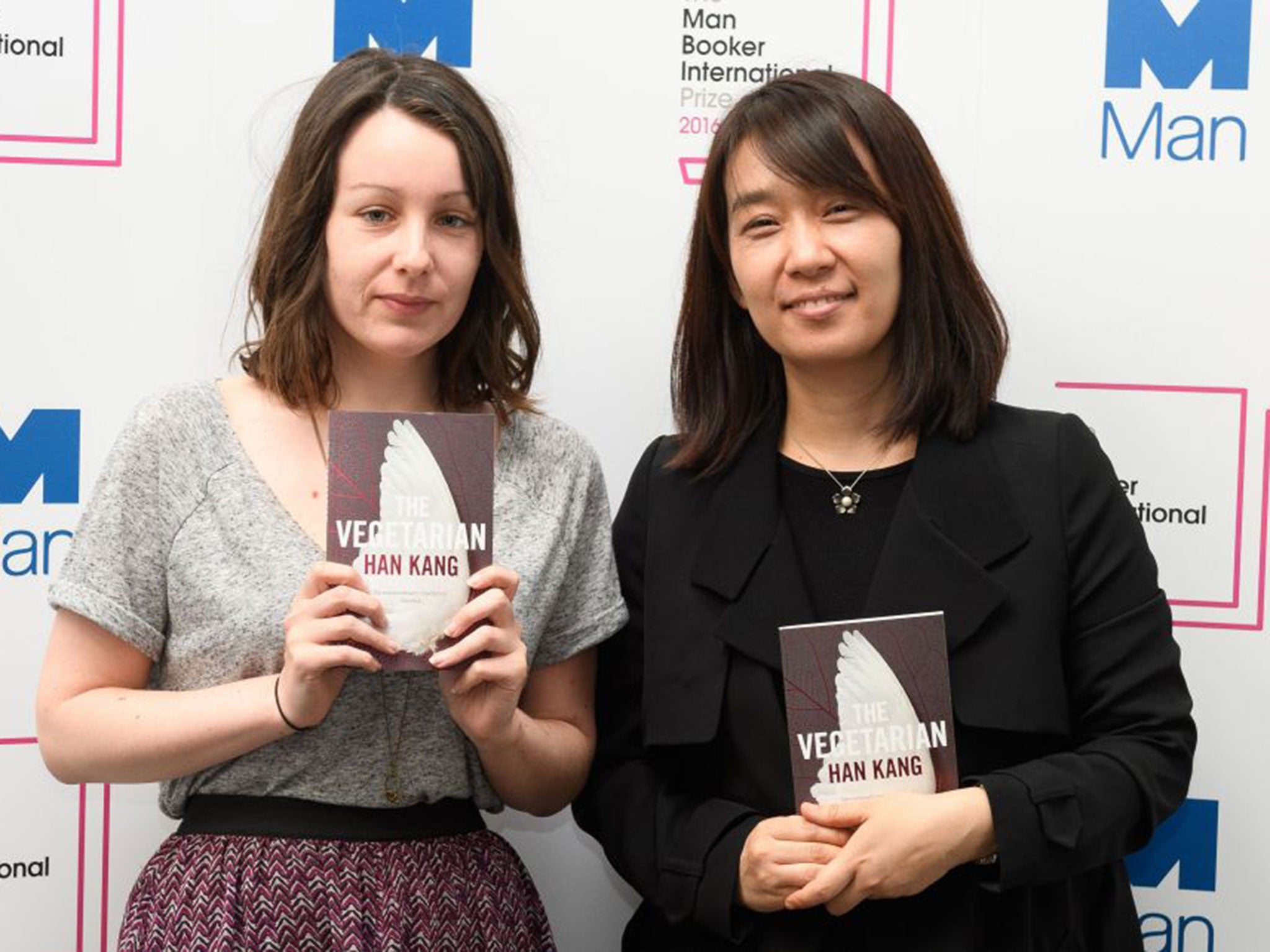 Han Kang (right) and her British translator, Deborah Smith, with the winning book, The Vegetarian