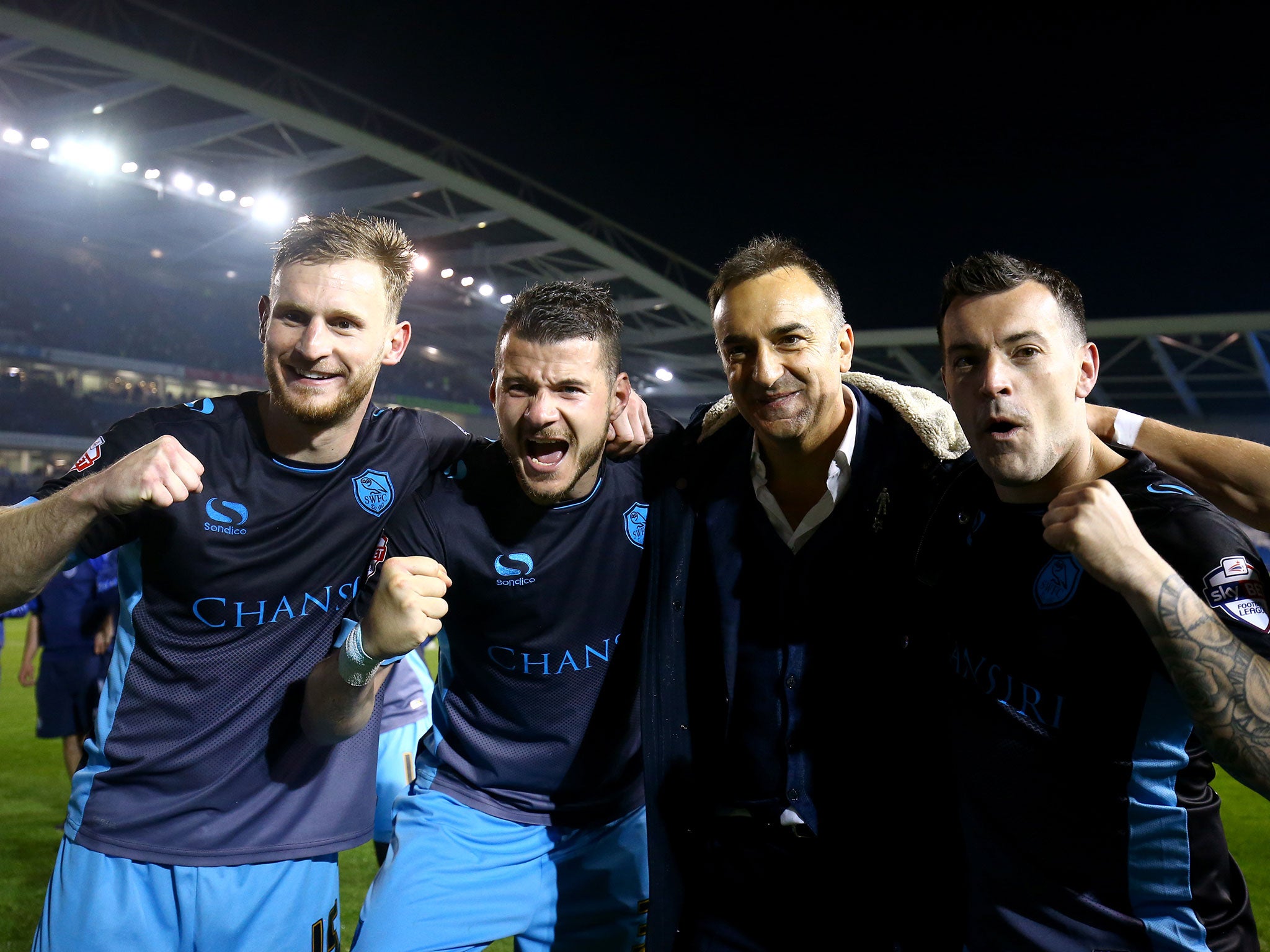 Sheffield Wednesday's Tom Lees, Daniel Pudil, manager Carlos Carvalhal and goalscorer Ross Wallace