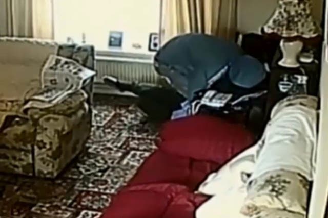 Video shows man tackling and robbing 88-year-old woman in her own home in 'vile' attack