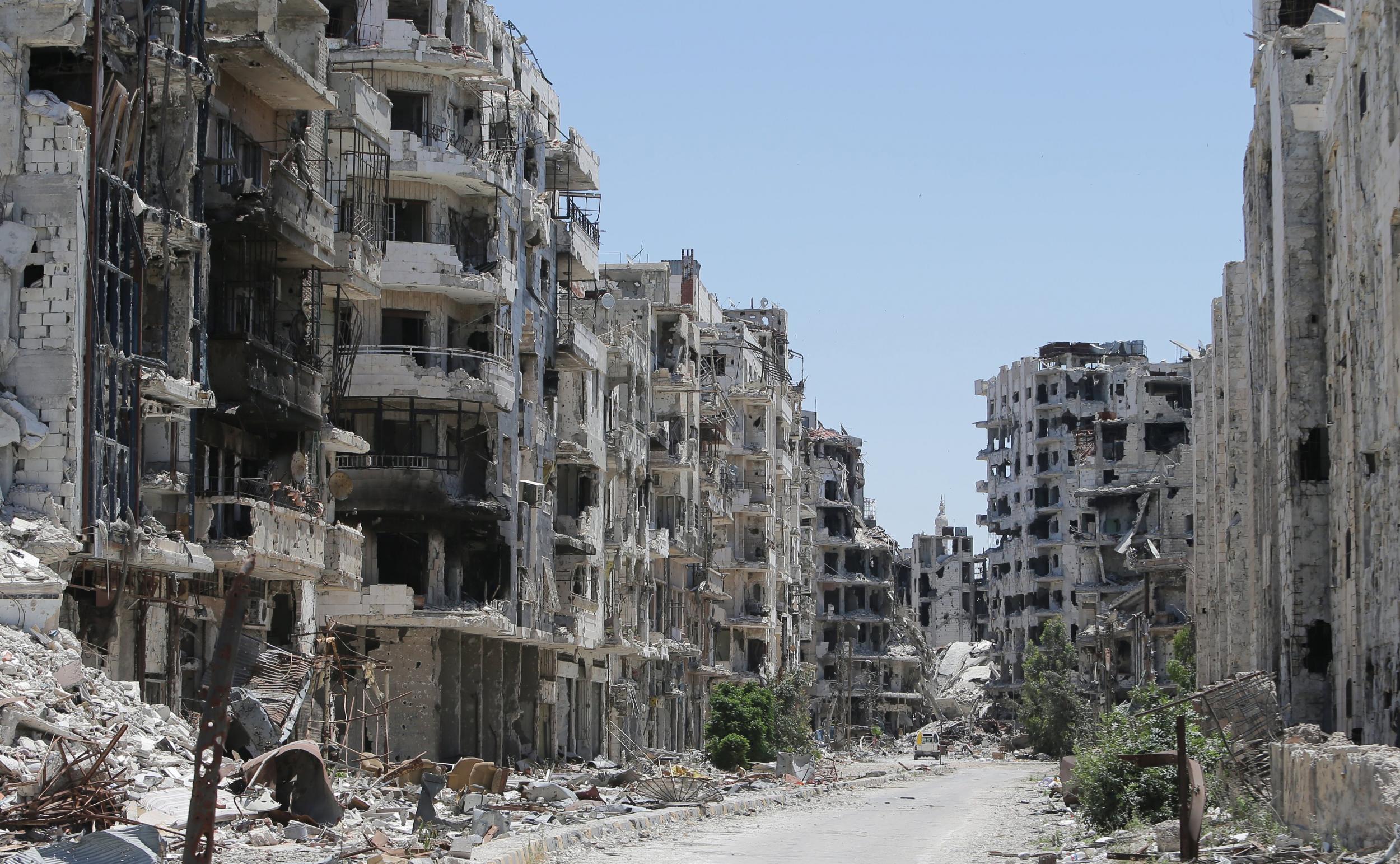 Syrian rebels evacuated Homs in May 2014 in a deal that handed the wrecked city back to the government