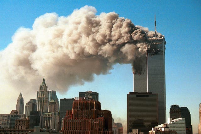 <p>Smoke pours from the twin towers of the World Trade Center after they were hit by two hijacked airliners in a terrorist attack September 11, 2001</p>